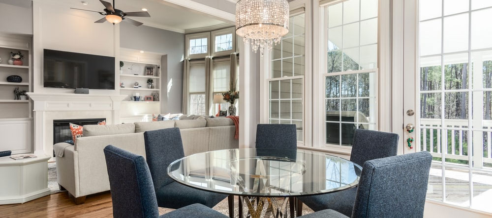 glass table surrounded with chairs